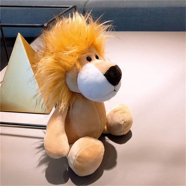Tan lion plush with a fluffy golden mane, cream-colored muzzle, and rounded paws, 25 cm