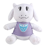 Toriel Undertale goat plush with floppy ears, small horns, purple outfit, and blue chest emblem