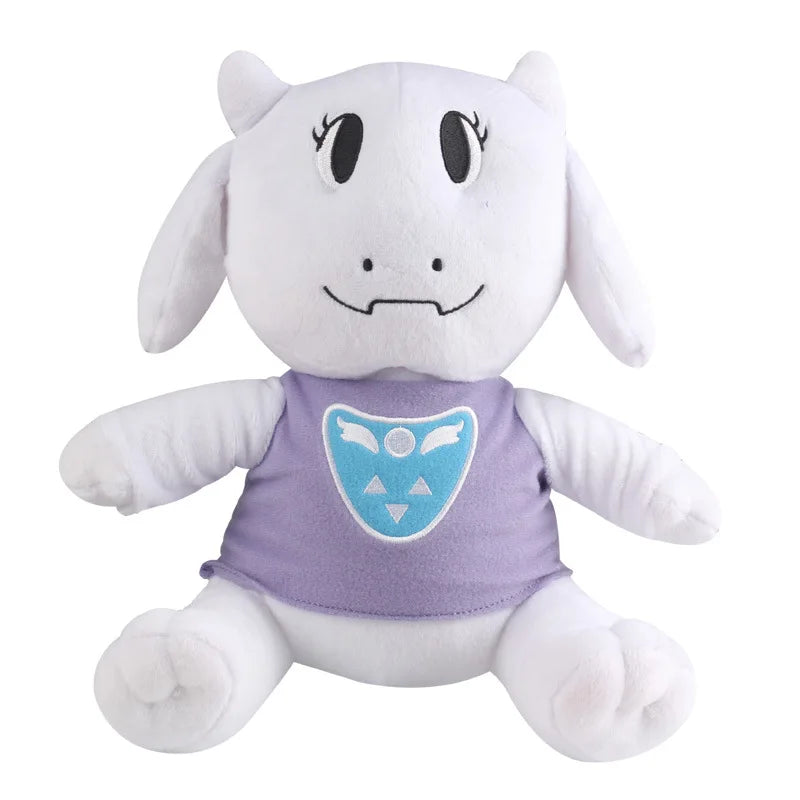 Toriel Undertale goat plush with floppy ears, small horns, purple outfit, and blue chest emblem