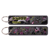 Front and back of the Shiny Rayquaza double-sided embroidered keychain with metal split ring