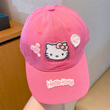 Magenta Hello Kitty baseball cap with raised character face and curved brim