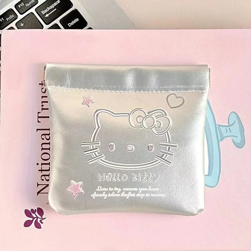 Silver-tone Hello Kitty storage pouch with white bow artwork
