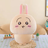 Cream-colored Usagi rabbit plush from Chiikawa with tall pink-lined ears, pink cheeks, and small feet, 16–18 cm
