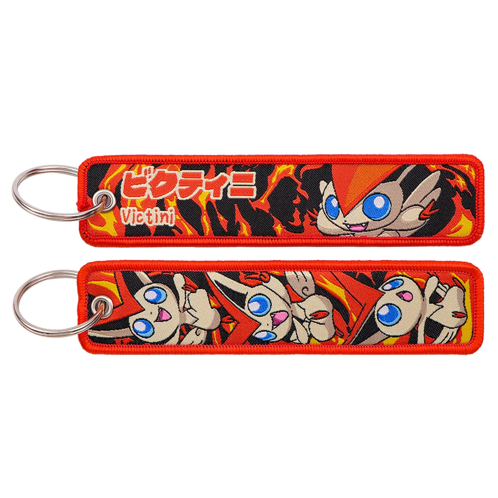 Victini Pokémon Embroidered Keychain — orange flame artwork
