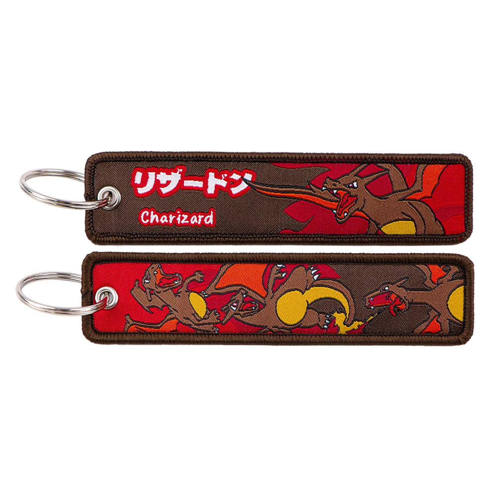 Front and back of the Charizard double-sided embroidered keychain with metal split ring