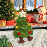 Smiling green Christmas tree plush keychain with a star topper, colorful ornaments, metal keyring, and brown feet