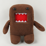 Brown Domo-kun plush with black eyes and a red mouth lined with four white teeth in each row