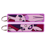Front and back views of an Espeon embroidered Pokémon keychain