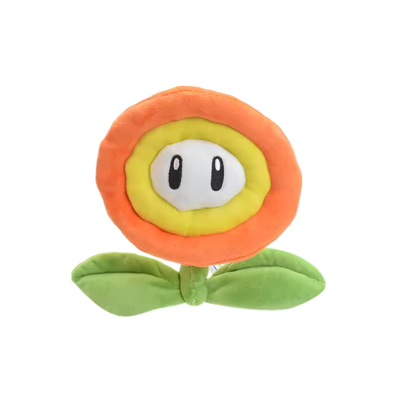 Orange Fire Flower plush with yellow center and green leaves