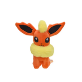 Seated orange Flareon Pokémon plush with large black-lined ears and a fluffy yellow collar