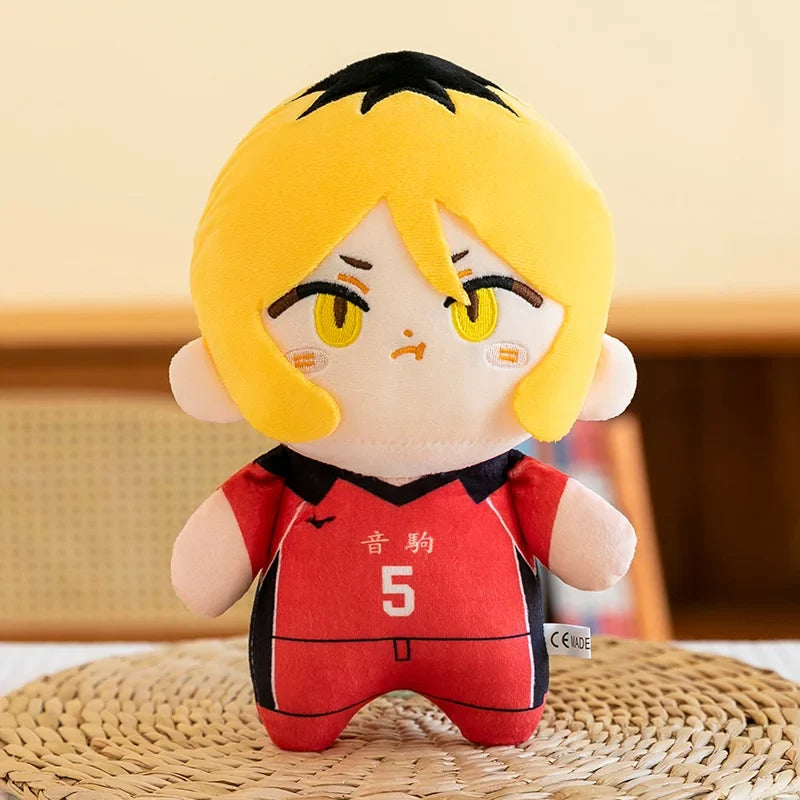 Kenma Kozume plush with blond hair with dark roots and a red number 5 volleyball uniform