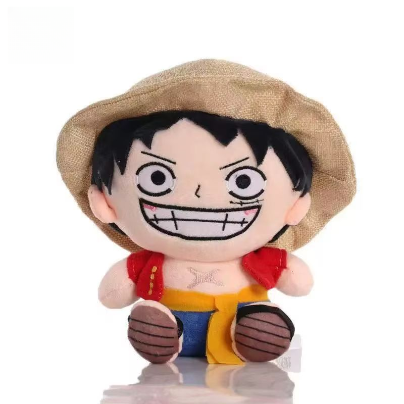 Monkey D. Luffy One Piece plush wearing a straw hat, red vest and yellow sash
