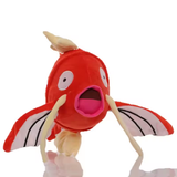 Magikarp character plush with open mouth and spread fins on a white background