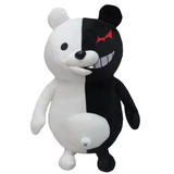 Black and white Monokuma plush with red eye and grinning face