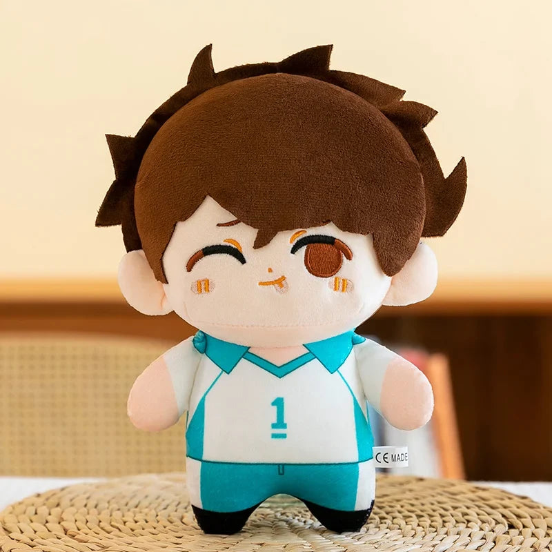 Toru Oikawa plush with brown hair, a winking expression and a white-and-teal number 1 volleyball uniform