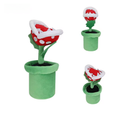 Piranha Plant plush with red spotted head, white teeth, and green pipe
