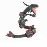 Black Rayquaza Pokémon plush with yellow rings and red accents