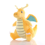 Seated orange Dragonite Pokémon plush with striped cream belly and blue wings