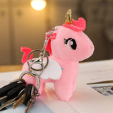 Small pink unicorn plush keychain with a golden horn and white wings