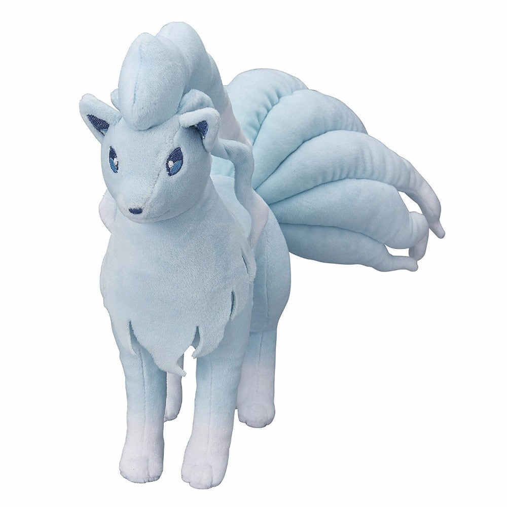 Pale blue Alolan Ninetales Pokémon plush with blue eyes and sweeping tails, front view
