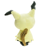 Back of Mimikyu Pokémon plush showing its brown zigzag tail