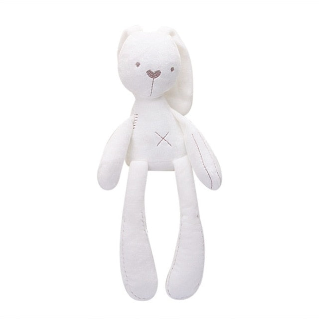 White long-eared bunny plush with gray ear panels, stitched face, and X belly accent