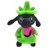 Ralsei Deltarune plush, 25 cm, with green hat and robe, pink scarf, round glasses, and black heart