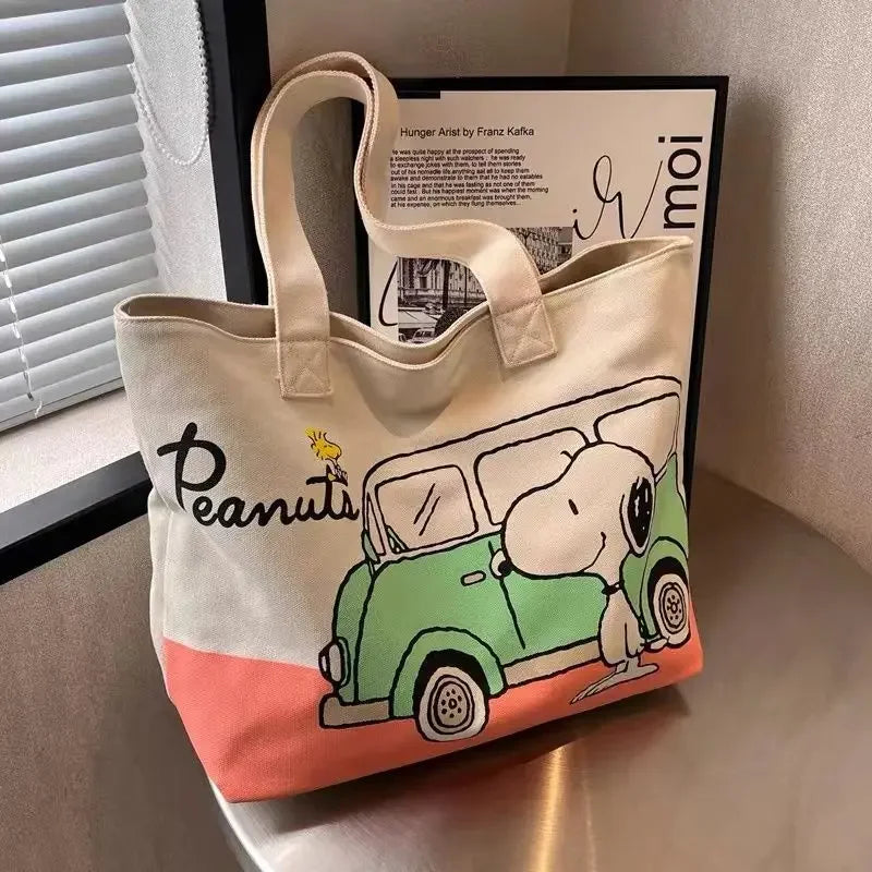 Snoopy and Woodstock canvas tote with green car print and cream handles