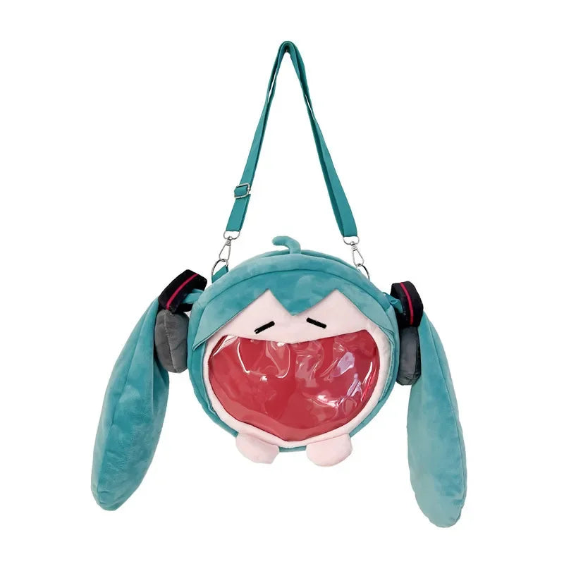 Teal Hatsune Miku plush shoulder bag with twin tails and clear pink front window