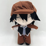 Ranpo Edogawa plush with black hair, closed smiling eyes and a brown cap and cape