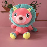 Front view of pink Chimera plush with blue-green mane and yellow horns