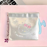 Silver-tone Hello Kitty storage pouch with pink bow artwork