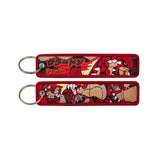 Front and back of the Groudon double-sided embroidered keychain with metal split ring