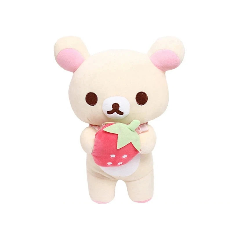Cream-colored Korilakkuma plush holding a red strawberry