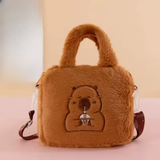 Brown capybara boba plush handbag with embroidered drink motif, plush handle, and shoulder strap