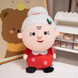 Mrs. Claus plush with white hair, holly detail, and a red dress with snowflakes