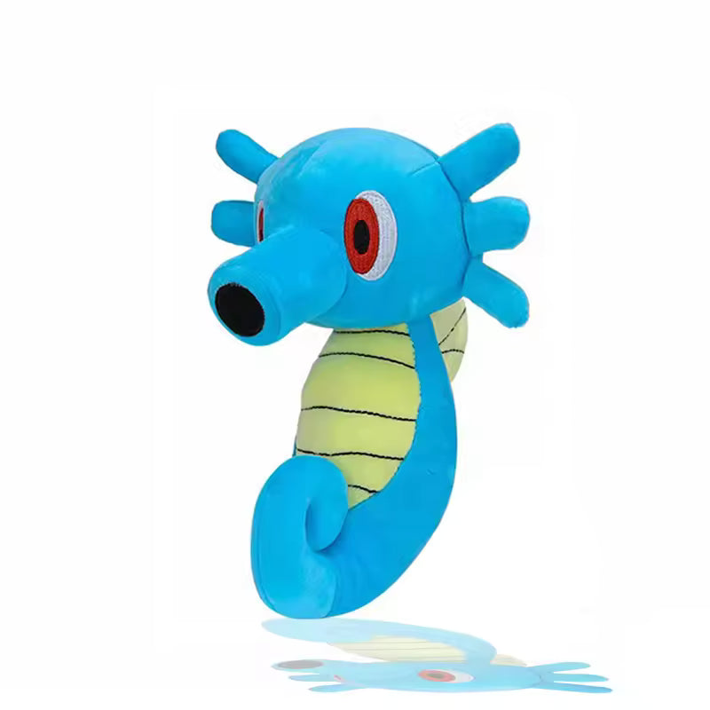 Blue Horsea Pokémon plush with red eyes, a yellow belly and curled tail