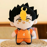 Yu Nishinoya plush with spiky black hair with a blond forelock and an orange number 4 volleyball uniform
