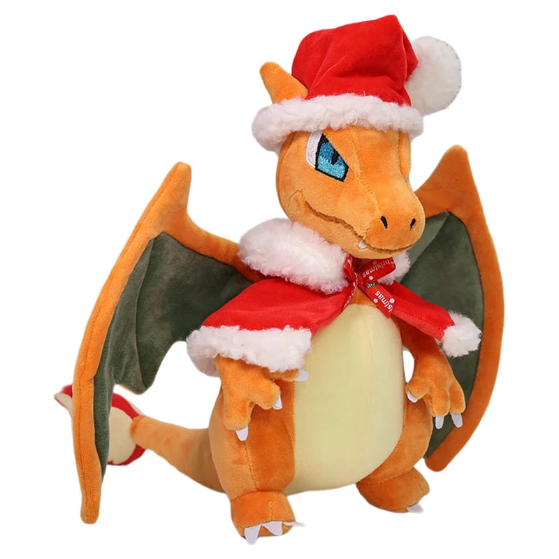 Orange Charizard plush wearing a red Santa hat and Christmas cape with green wings