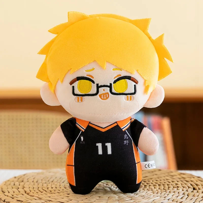 Kei Tsukishima plush with blond hair, glasses and a black number 11 volleyball uniform
