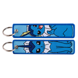 Front and back views of one blue Vaporeon Pokémon embroidered keychain
