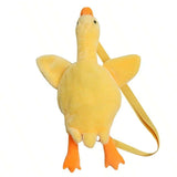 Yellow duck plush shoulder bag with a long neck, orange beak and feet, outstretched wings and matching shoulder strap