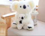 White mother-and-baby koala plush with fluffy ears and black noses, approximately 28 cm