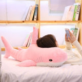 Pink shark plush with white belly and side fins